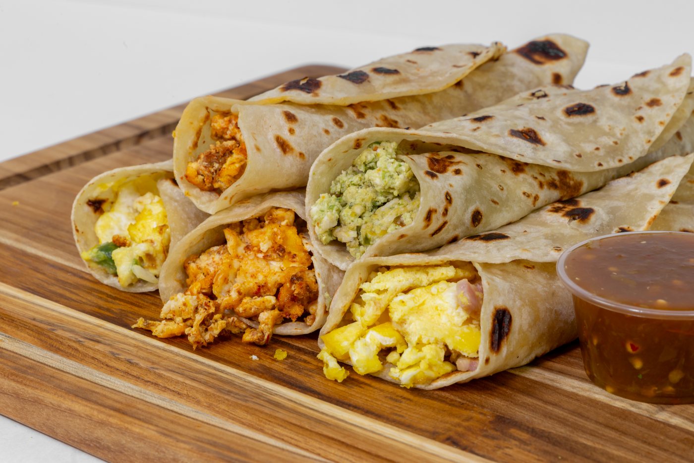 Breakfast tacos fresh off the comal at Korner Market — chorizo, papa con huevo, and more