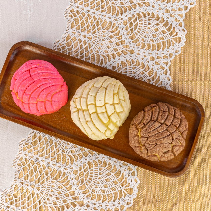 Conchas — pink, vanilla, and chocolate pan dulce — Korner Market